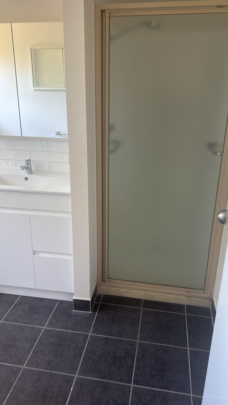 Renovated bathroom with new bath after KDK